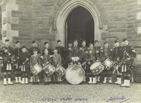 Stow Pipe Band in from of St Mary’s church  - 1950s