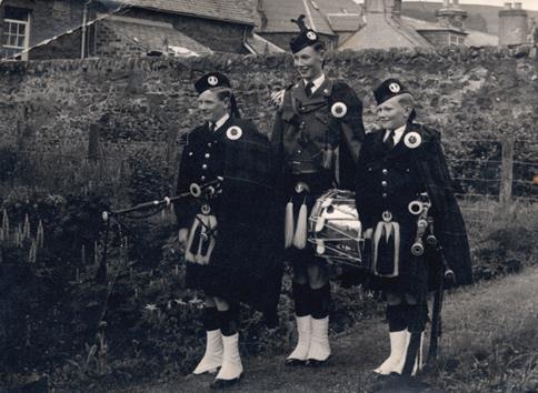 three young members of Stow Pipe Band  - 1950s